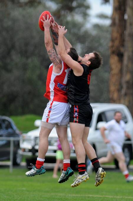 STRONG: Taylors Lake's Nathan Koenig, pictured marking in front of Noradjuha-Quantong's Brady King, starred for the Lakers against Pimpinio on Saturday. Picture: SAMANTHA CAMARRI