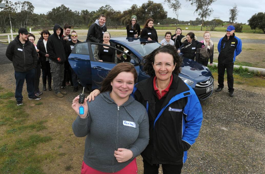 FINDING MOTIVATION: Federation University student Tamika Walsh, with The Motorvation Foundation’s Jennie Hill and fellow students, takes part in a Motorvation program at Wimmera Kart Racing Club in Horsham on Tuesday. The program is targeted at young drivers. Picture: PAUL CARRACHER