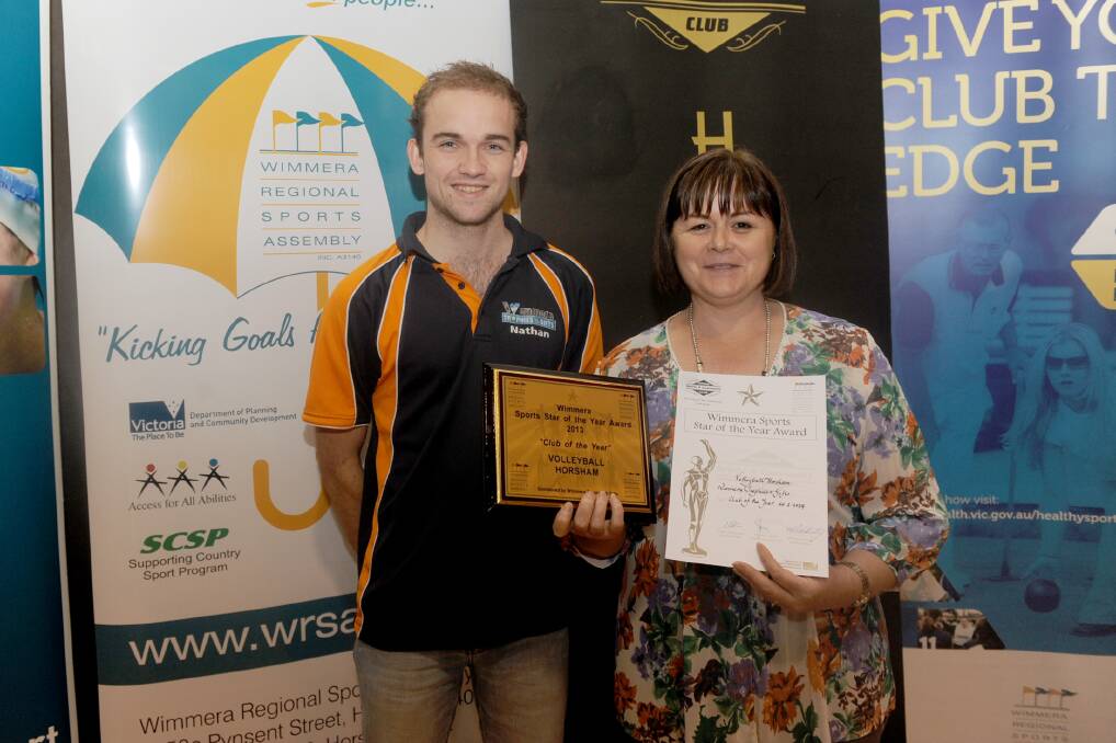 CLUB OF THE YEAR: Volleyball Horsham representative Nathan Berry accepts the award from Anne Radford.