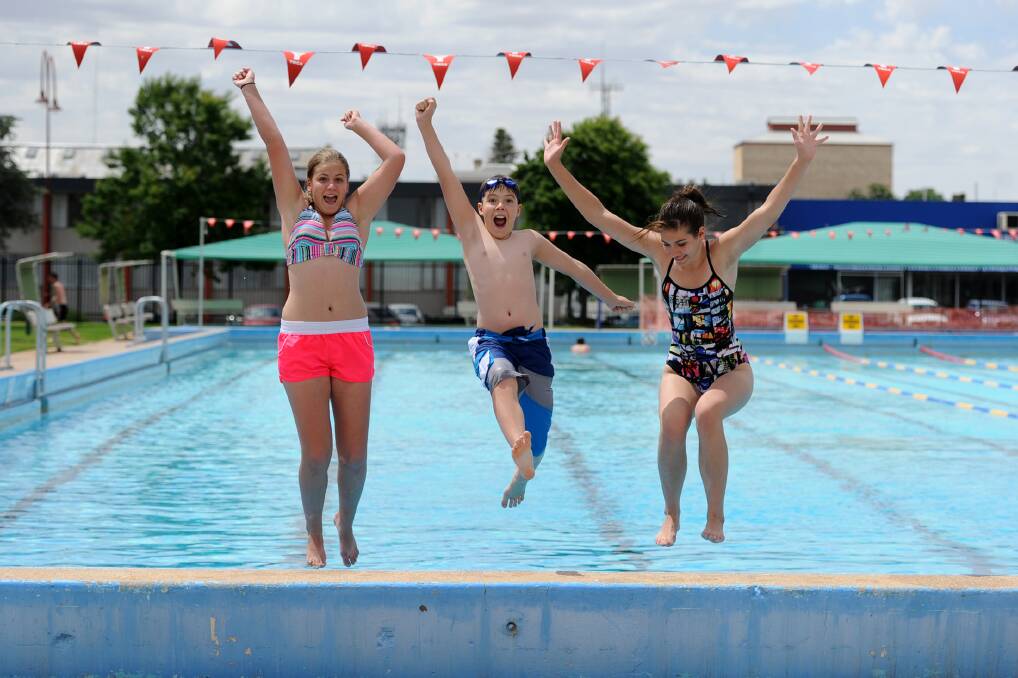 DECEMBER: Jessica Nanninga and her siblings Ty and Victoria keep cool at the Horsham Aquatic Centre.