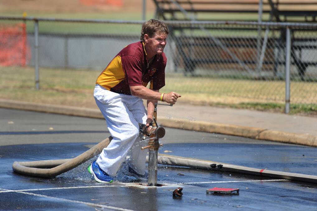 Paul Winsall of Warracknabeal competes in the seniors hose and reel event at the CFA District 17 Marshal Day.