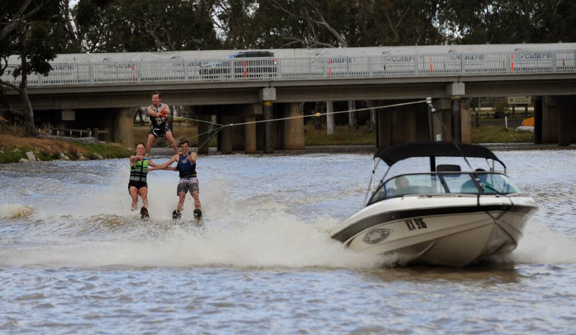 From left, Rhona Conboy, Nick Hinch and Alex Cameron of the Natimuk Ski Club on Wimmera River for the 2013 Kannamaroo. Picture: PAUL CARRACHER