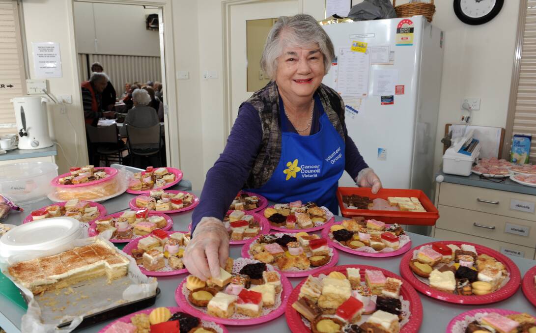 Beryl Lampard does her part at the Horsham Cancer Council's Biggest Morning Tea. Picture: PAUL CARRACHER