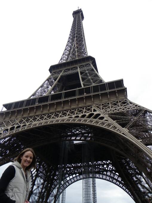 Carly Werner gets familiar with a Paris landmark.