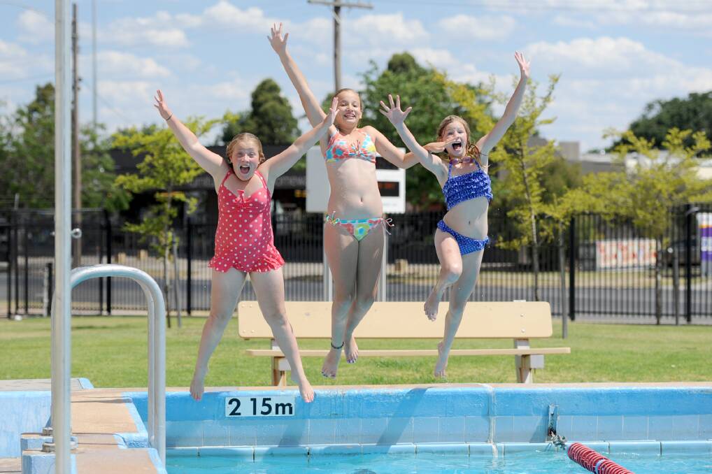JANUARY: Destany Dickerson-Cornell, Tori Foster and Amanda Winfield keep cool at Horsham Aquatic Centre.
