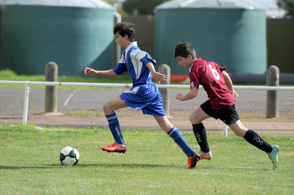 Horsham Falcon Noah Talbot races ahead with the ball. The team claimed its first win at the weekend. Picture: SAMANTHA CAMARRI