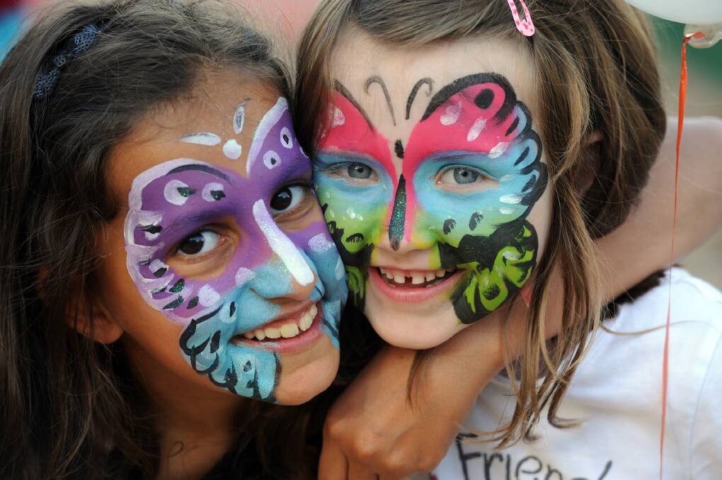 COLOURFUL: Tori Phelan, 11, and Annabelle Bennett, 6, get into the spirit of things at Warracknabeal’s Creekside Food Fest. Picture: PAUL CARRACHER
