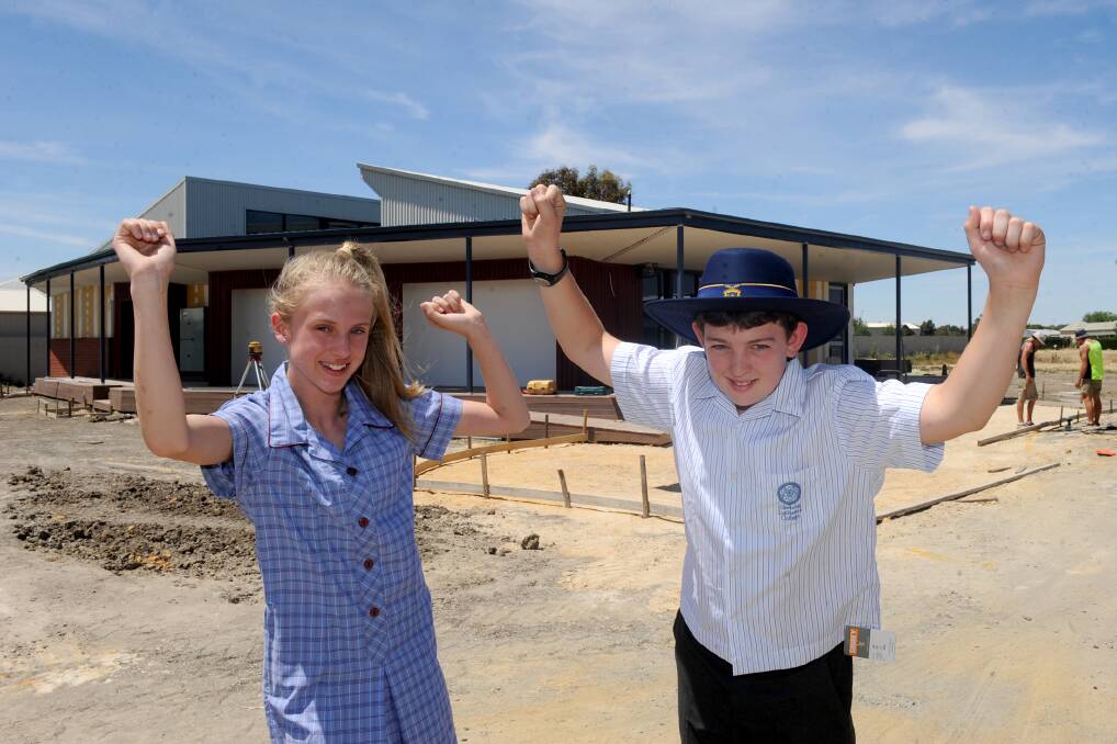 DECEMBER: Tarlie McCartney and Callum Hayes prepare for year seven at Holy Trinity Lutheran School in Horsham.