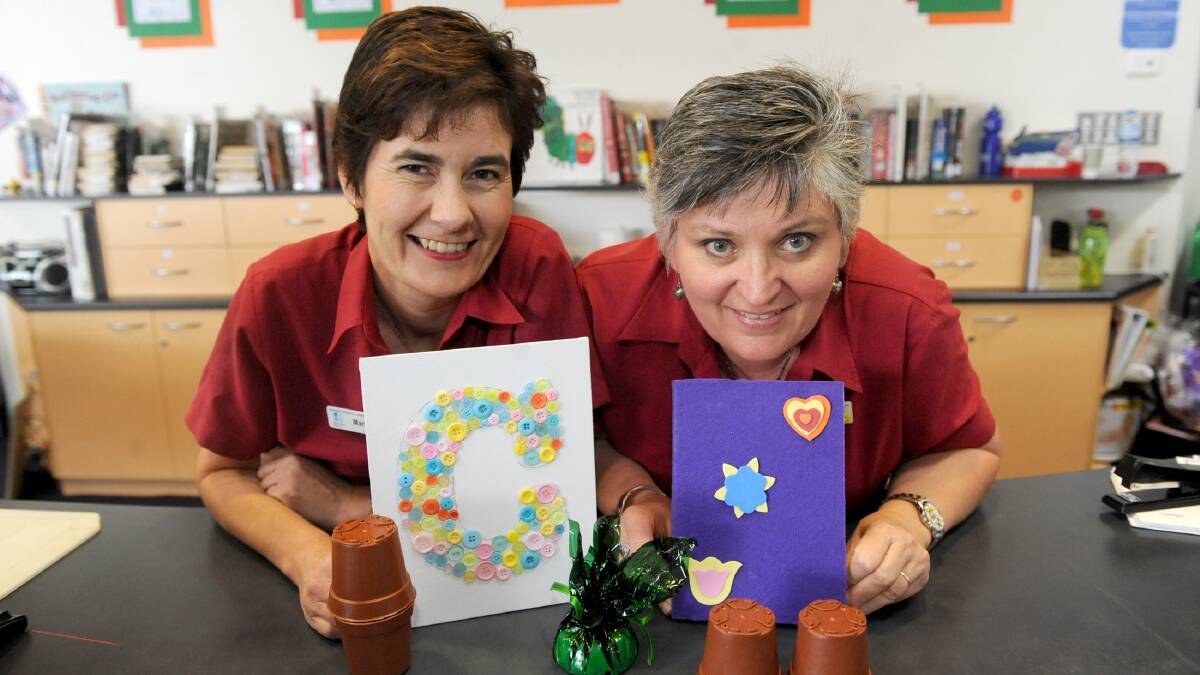 READY FOR CRAFT: Horsham Library staff Margaret Barbetti and Pauline Lentsment prepare for school holiday activities. Picture: SAMANTHA CAMARRI
