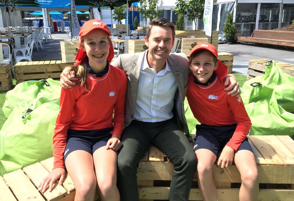 FAMOUS: Siblings Nia and Archie Harrison, with Channel 7's Todd Woodbridge. Woodbridge interviewed the pair, with the footage to be shown during the men's final.