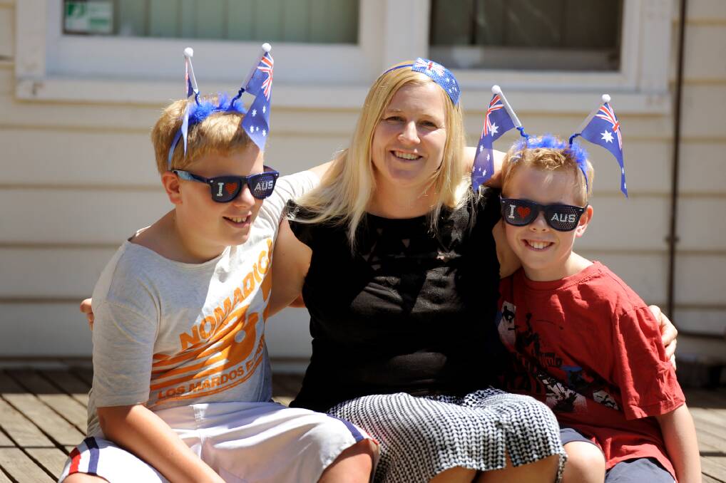 JANUARY: Nicole Fischer and her two sons, Angus and Damon, will do the Colour Run in Melbourne to raise money for MS. They wil wear their Australia Day attire during the run.