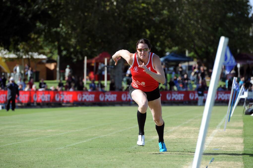 STAR ATTRACTION: Australian Olympian Jana Pittman races hard in her heat of the Endura Sports Lorraine Donnan 400-metre Women's Handicap. Pictures: PAUL CARRACHER
