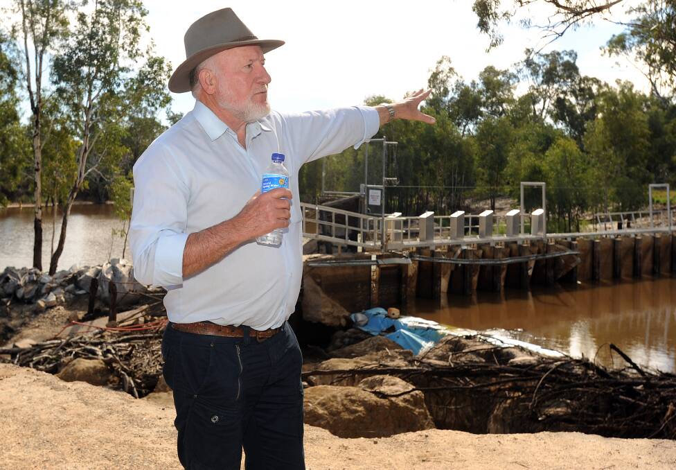 REBUILT: John Forrest checks out the damage to the Dimboola Weir. The repaired weir will be officially opened on Friday. Picture: KATE HEALY