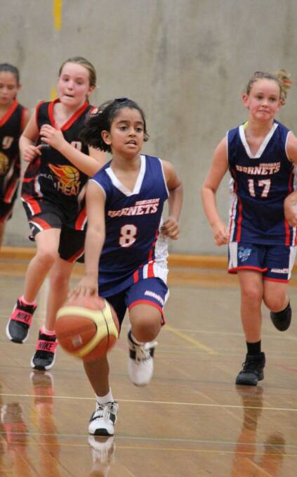 DRIBBLE: Nethmi Rodrigo moves the ball up court of the girls under-12 team during the Bendigo Classic. Picture: CONTRIBUTED