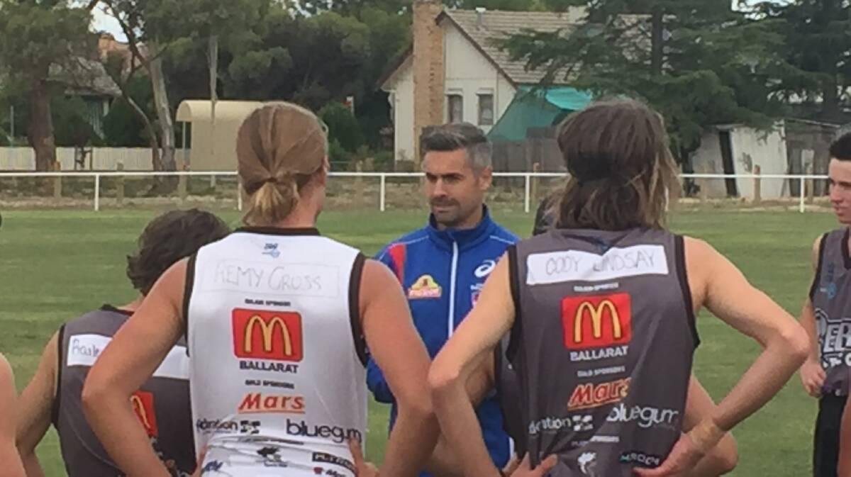 EXPERIENCE: Daniel Giansiracusa runs the Wimmera Rebels players through drills at Dudley Cornell on Monday. 