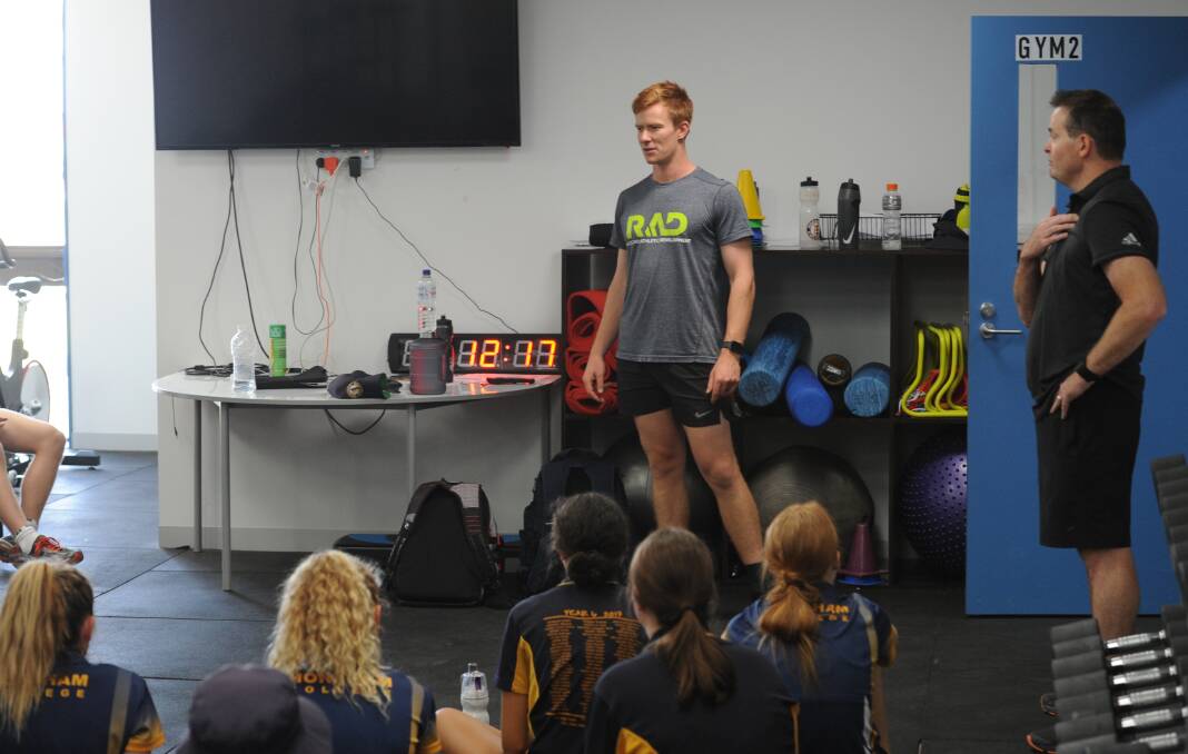 COACH: Chris Radford talks to Horsham College students about how to develop the strength to excel at their chosen sports. Picture: STUART McGUCKIN