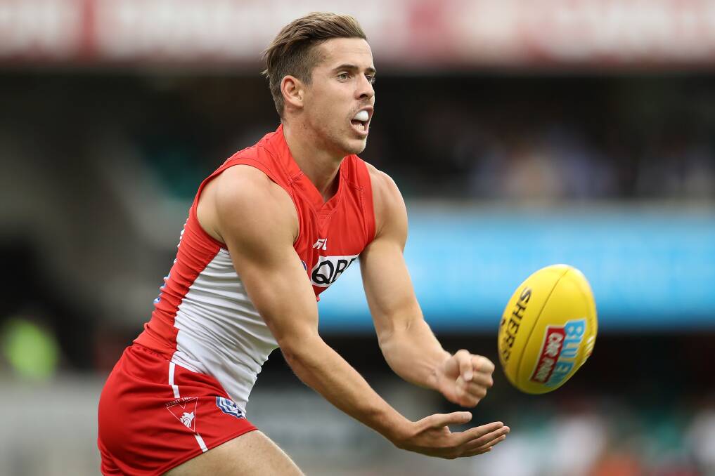 HANDS: Jake Lloyd has played consistent football in his fourth season on the Sydney Swans senior list. Picture: GETTY IMAGES