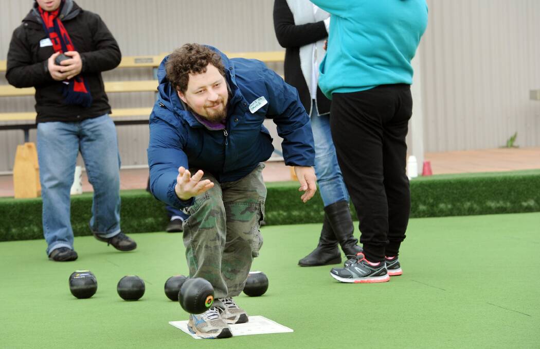SEND IT DOWN: Tavis Starick, Ararat, sends one down during the All Abilities bowls at Stawell Bowling Club. Picture: PAUL CARRACHER
