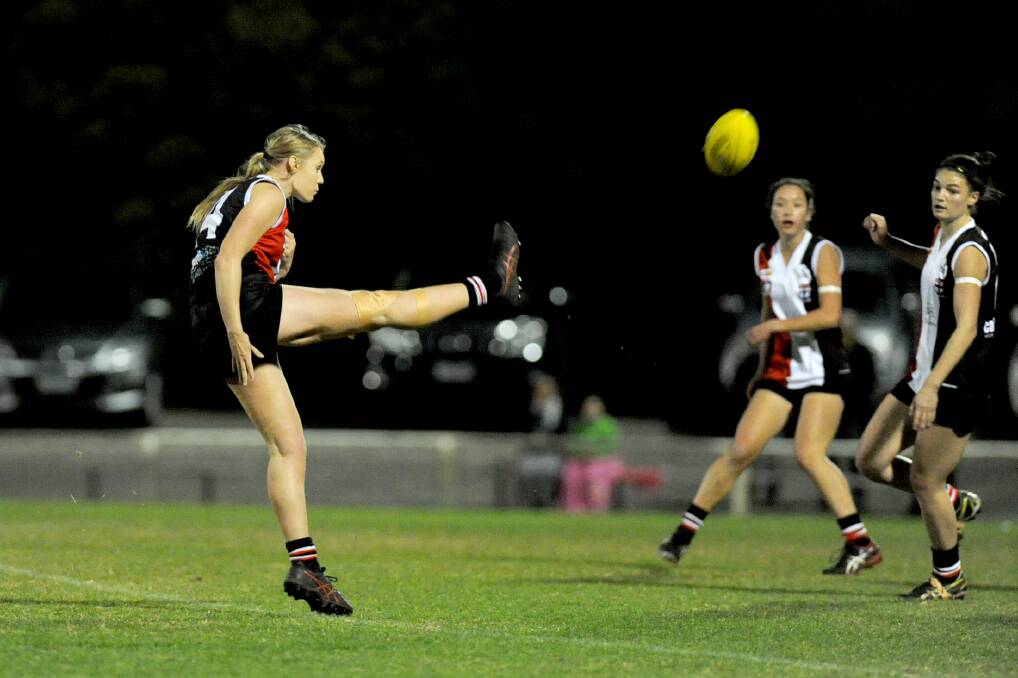 BIG KICK: Ashley Hobbs boots the ball forward for the Saints during the side's win against Horsham in round six. Picture: SAMANTHA CAMARRI