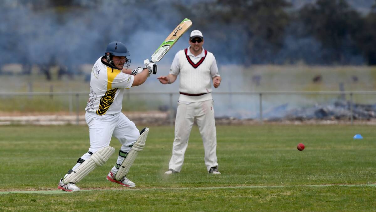 RUN MACHINE: Brett Jensz cuts the ball earlier this season. His century was not enough to get Jung Tigers over the line. Picture: SAMANTHA CAMARRI