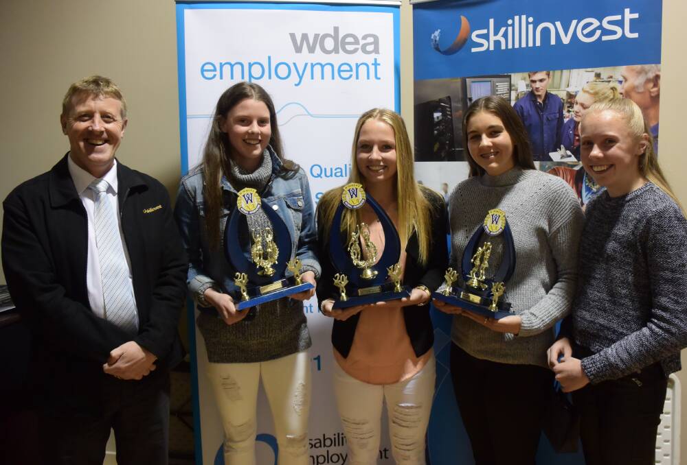 Runner-up Tessa O'Callaghan, winner Tamika Mentha, third-placed Georgie Carberry and rising star Stephanie Glover with the Skillinvest representative.