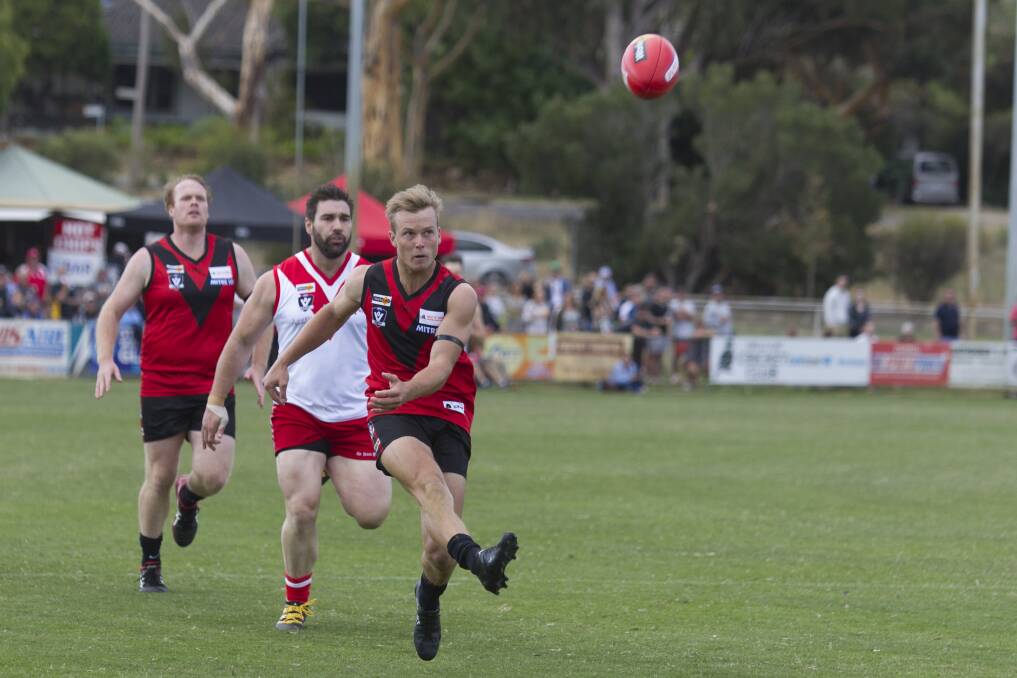 LEADER: Stawell coach Tom Eckel delivers the ball forward during his side's first round win against Ararat. Picture: PETER PICKERING