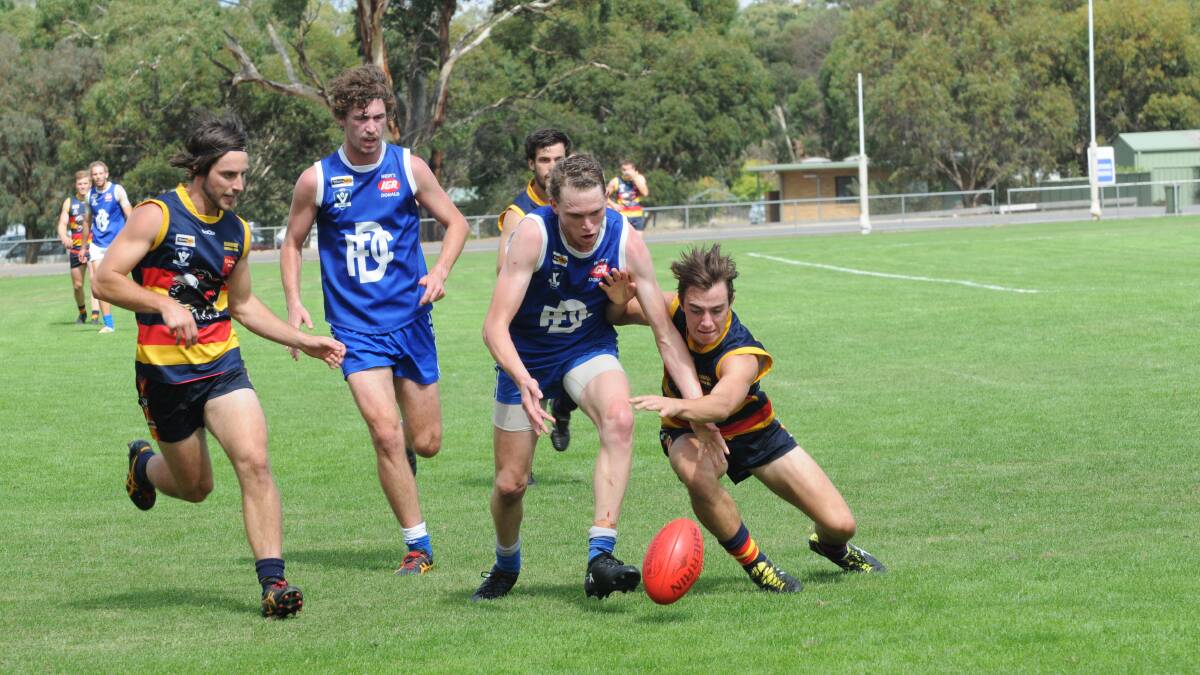 Donald's Caleb Powell contest possession with a Beaufort opponent during a pre-season game. Picture: BULOKE TIMES