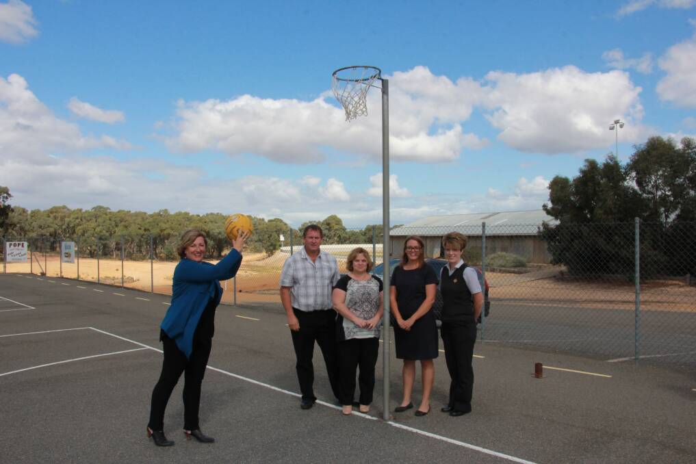 Danielle Green MP, Cr Graeme Milne from Buloke Shire and local netballers welcome the latest funding. Picture: CONTRIBUTED