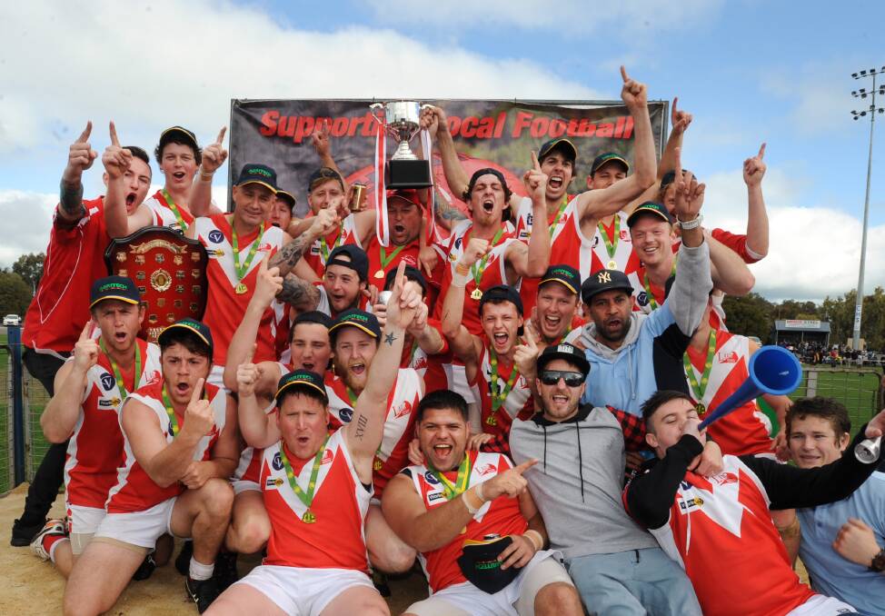 Taylors Lake celebrate the clubs first premiership since 1998 after winning the reserves grand final. Picture: PAUL CARRACHER