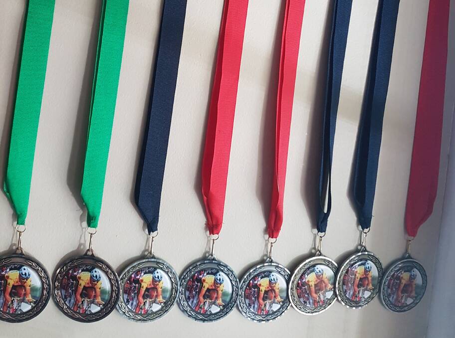 Just some of the medals hanging on the wall of the Denham family home.