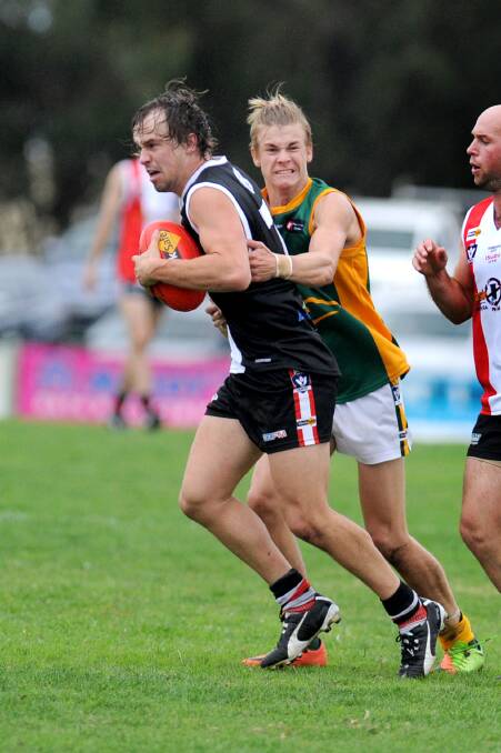 TIGHT: Dimboola will look to heap the pressure on against Sam Clyne and the Horsham Saints in Saturday's round nine match. Picture: SAMANTHA CAMARRI