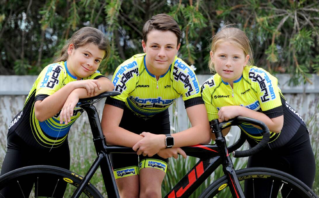RACERS: Pippa Denham, Tom Arthur and Minda Denham are doing good things on the cycling track. Picture: SAMANATHA CAMARRI