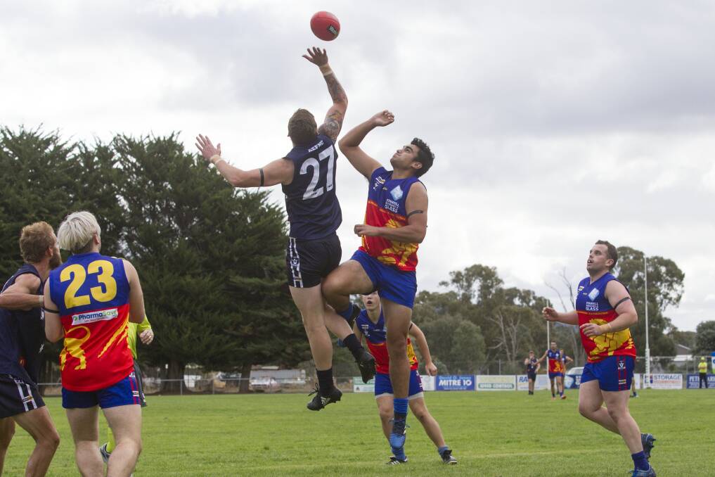 MILESTONE: Ararat's Nic Bulger contests against Great Western Taine Pearse. Bulger will play his 150th game for Ararat on Saturday. Picture: PETER PICKERING