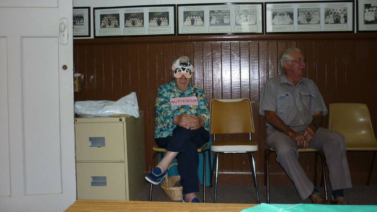 HONOURING CWA Victoria, product/resource, dairy, Buttercup, aka heavily disguised, Betty Turnbull was eager to hear guest speaker, Lance Netherway who spoke on life at Quantong and Netherby at Beulah's April meeting. Photo: Warrackbaneal Herald.