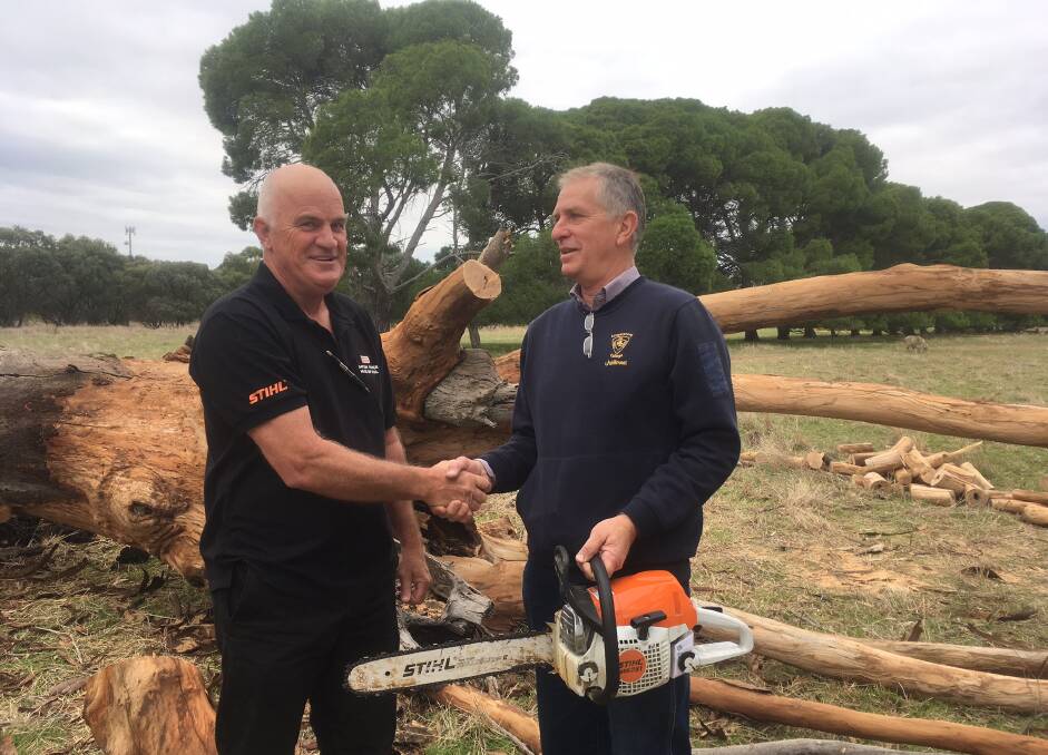 TRAINING: Graham Walker and Barry Ray pictured with Longerenong College’s new chainsaws used by students during training.