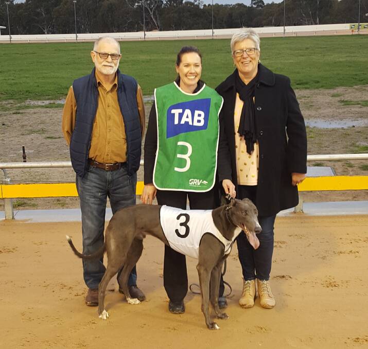 WINNER: Melissa Fullerton and the owners of Jimmy Newob after the greyhound's victory at Horsham this week.