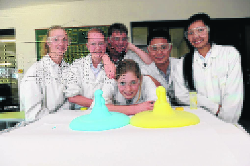Dimboola Memorial Secondary College students prepare for science week activities by making elephant toothpaste. From left, Rachel Clark, Jacqueline Walker, Kelly Summerhayes, Nicholas Crowhurst, Jayrell Guzarem and Janine Martin. Picture: PAUL CARRACHER