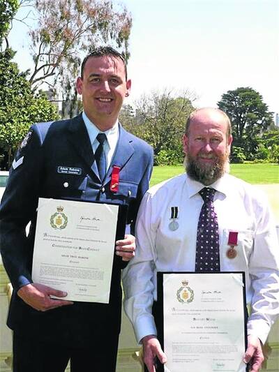 BRAVE: Senior Constable Adam Rabone and Ian Antonoff with the bravery awards received last week. Horsham's Bill Jorgensen also received an award. Picture: CONTRIBUTED