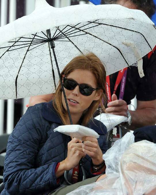 Princess Beatrice knows a thing or two about a short, sharp shower - and has a twee brolly to hand at day 7's equestrian events.