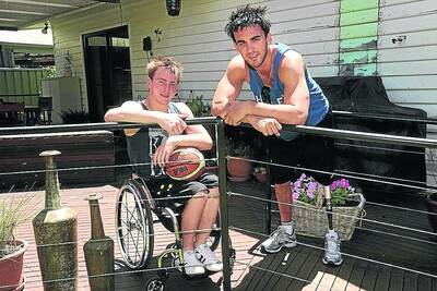 HOLIDAY HOME: Horsham�s Jannik Blair with friend and fellow Australian wheelchair basketballer Adam Deans. Blair is home from college in the USA.
