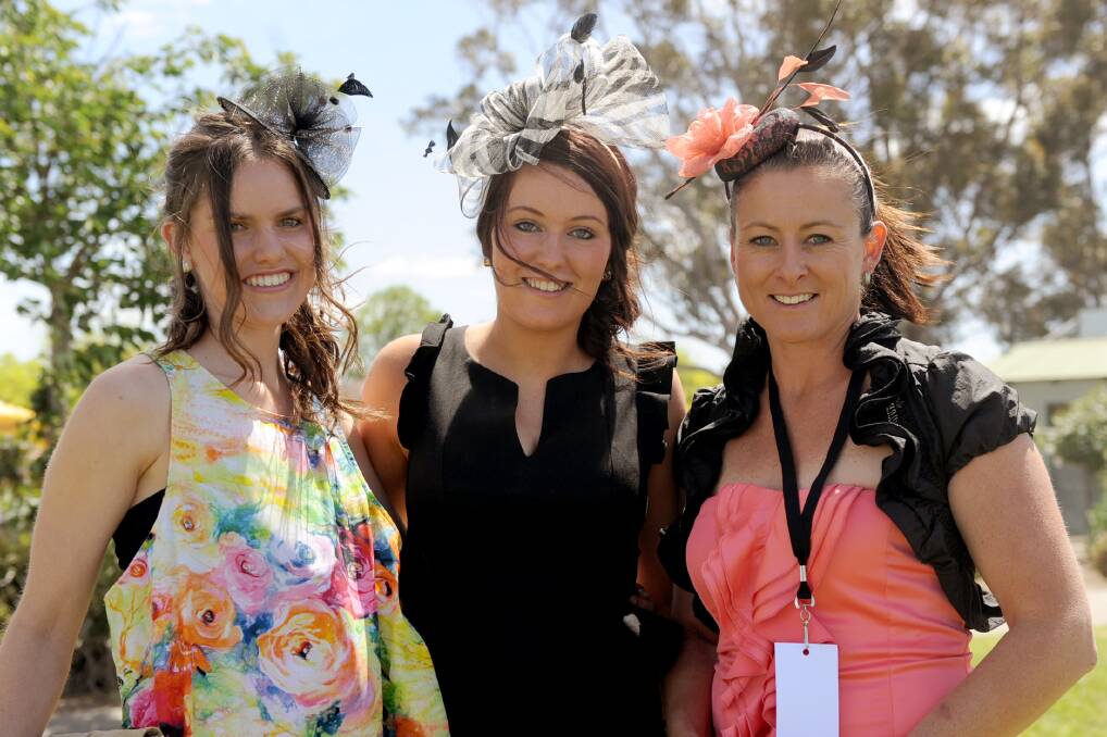 Laura Dixon, Mikaela Rigby and Jo Lane, all of Horsham, enjoy a fantastic Horsham Cup day yesterday. Picture: SAMANTHA CAMARRI