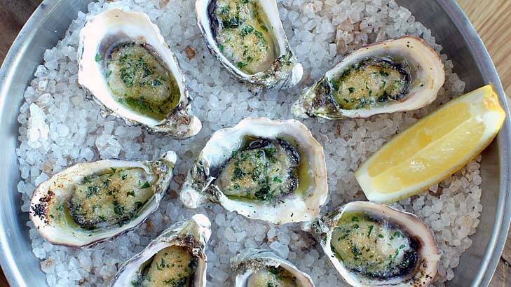 Oysters baked in their shells.