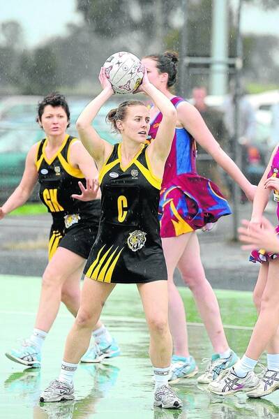 WET CONDITIONS: Pimpinio�s Jemima Rudolph looks for options during her side�s match against Great Western. Pictures: PAUL CARRACHER