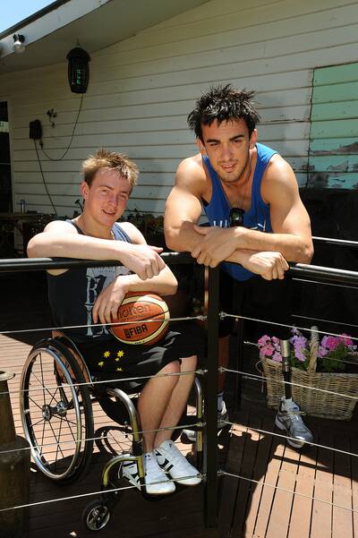 HOLIDAY HOME: Horsham basketballer Jannik Blair with good friend and fellow Australian wheelchair basketballer Adam Deans. Blair is home from college in the USA. Picture: PAUL CARRACHER
