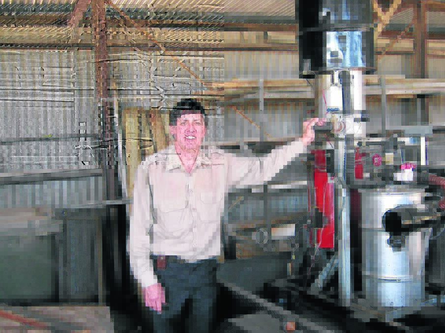 Ararat Rural City Council bio-energy support officer Daryl Scherger with a gasifier, which can turn raw plant materials into gas. Picture: CONTRIBUTED