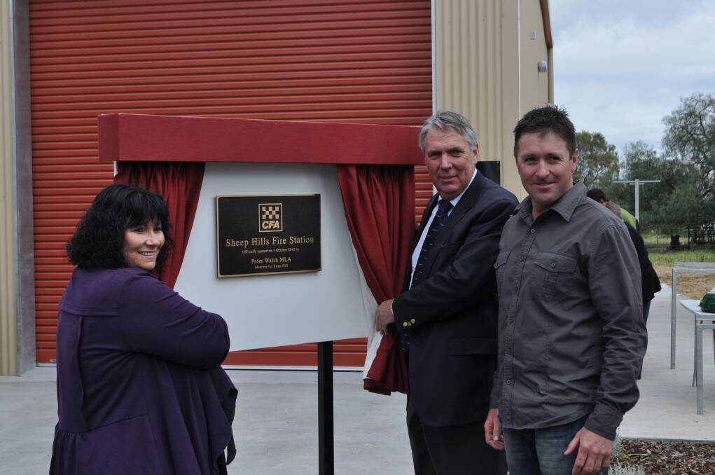Member for Swan Hill Peter Walsh, centre, opens the new Sheep Hills Fire Station with Yarriambiack Mayor Kylie Zanker and brigade captain Cameron Penny. Picture: CONTRIBUTED