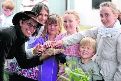 FUN TIMES: Animal of Oz's Lee Webley, Hannah Schmidt, 11, Alana Ryan, 6, Edwina Lees, 6, Will McDonald, 3, and Clementine Lees, 8, all of Edenhope, say hi to a new friend.