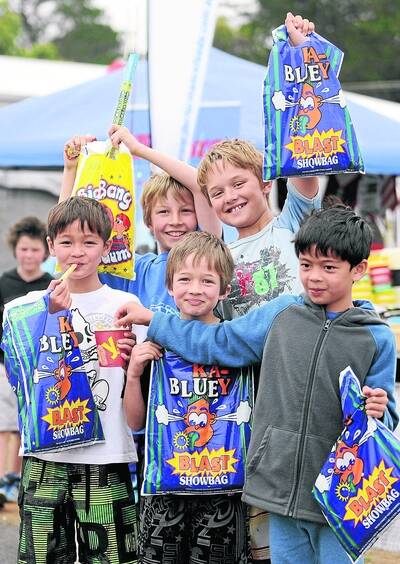 GOODY BAGS: Dylan Mahney, 7, of Perth, Max Crook, 10, of Mount Gambier, Will Crook, 8, of Mount Gambier, Thomas Mahney, 10, of Williams, WA, and Nathan Mahney, 7, of Perth, discover treats at the show.