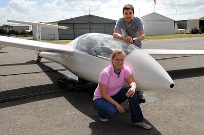 FLYING HIGH: Marta Najfeld and Ziggy Kusiak at the Horsham Aerodrome. Picture: PAUL CARRACHER