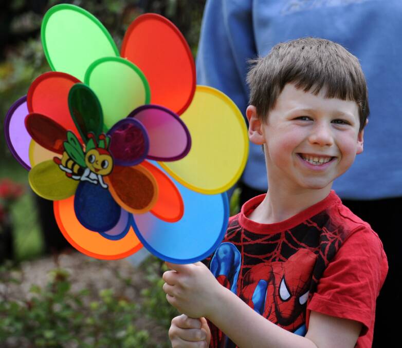 BRIGHT: Nathan Grainger, 6, pictured with a pin wheel, was all smiles at the Horsham Spring Garden Festival on Saturday. Picture: PAUL CARRACHER
